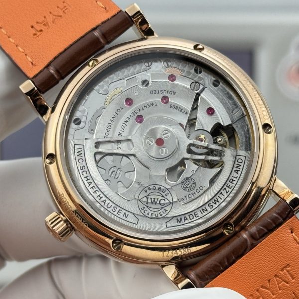 IWC Portofino Hand-Wound Moon Phase Blue Dial Gold Brown Leather Strap
