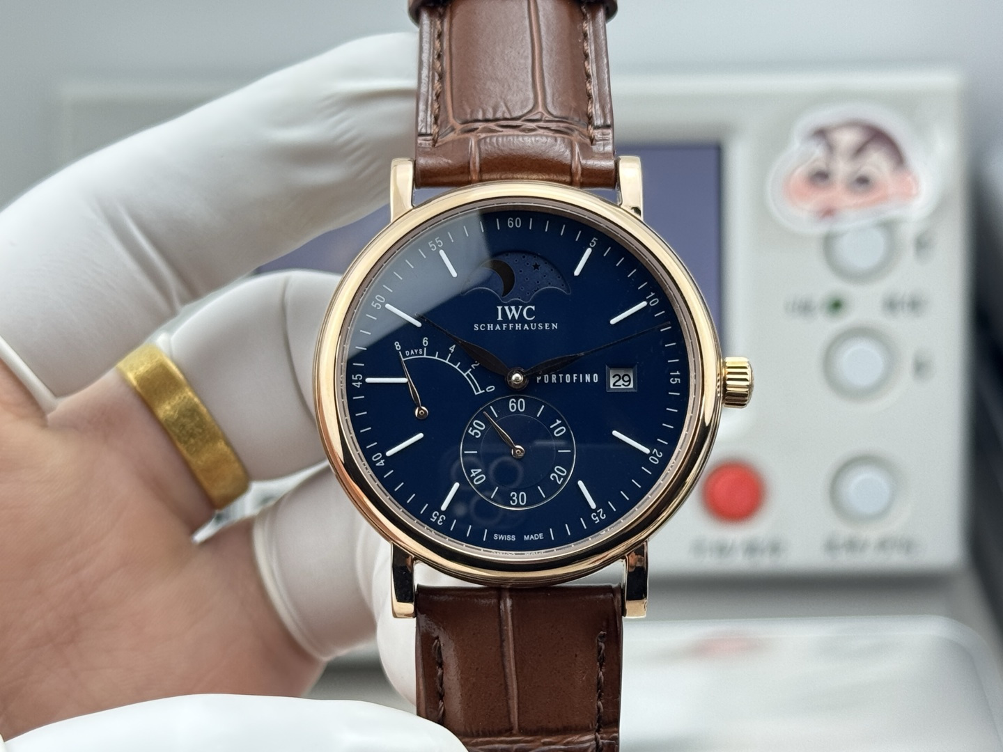 IWC Portofino Hand-Wound Moon Phase Blue Dial Gold Brown Leather Strap