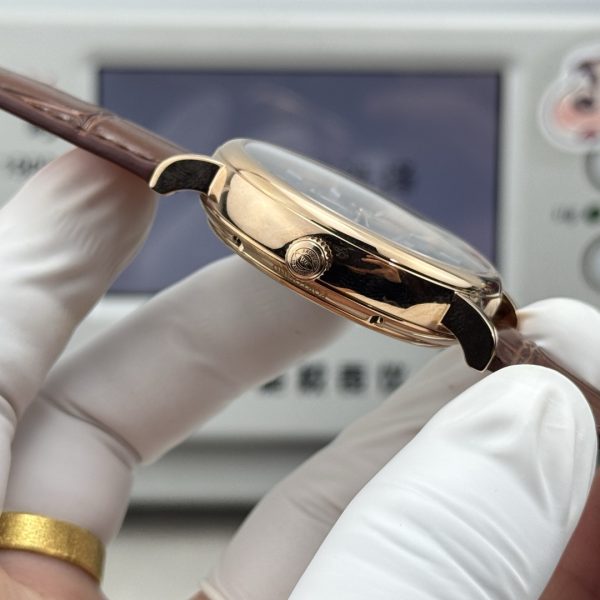 IWC Portofino Hand-Wound Moon Phase Blue Dial Gold Brown Leather Strap